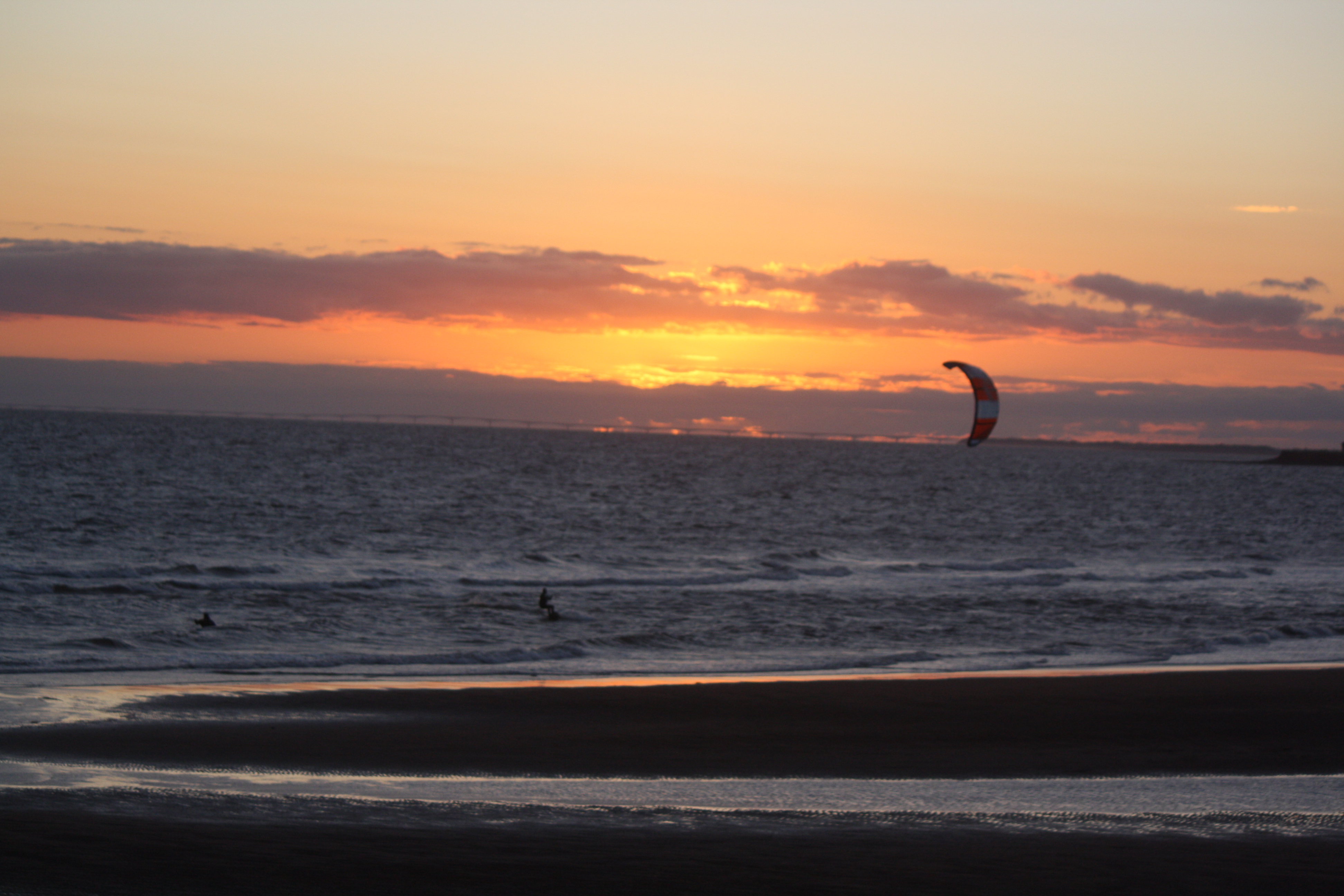 Beach sunset with kite