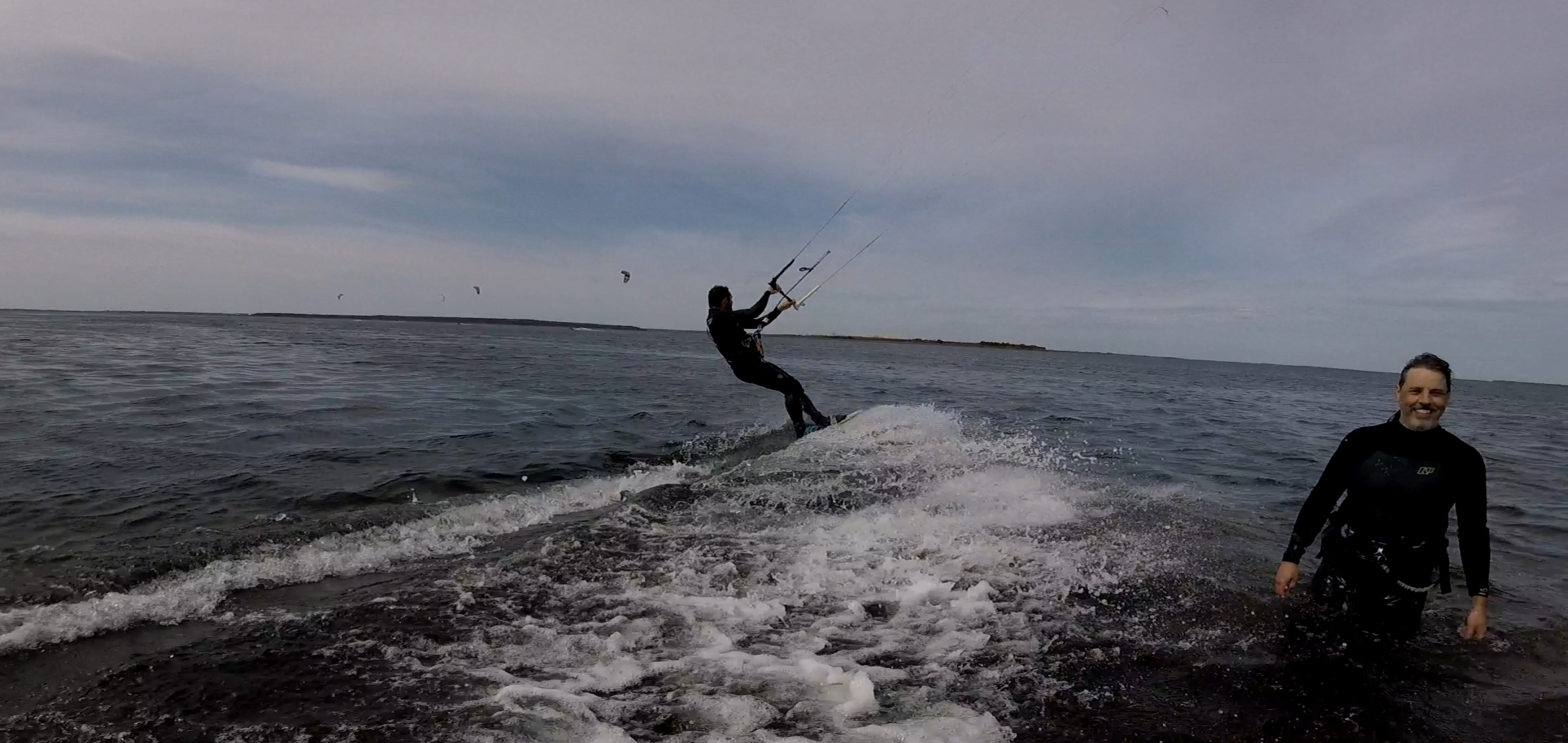 Kiteboarder on dark water