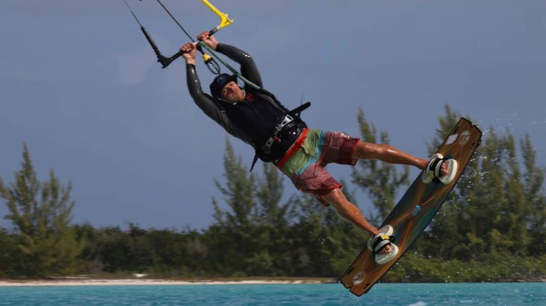 Kiteboarder performing a high jump