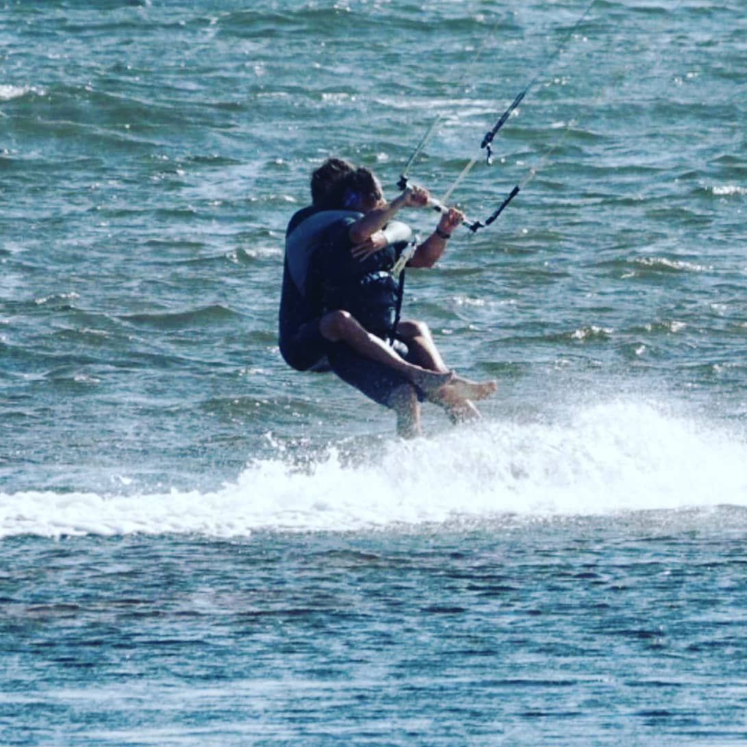 Kiteboarding at sunset