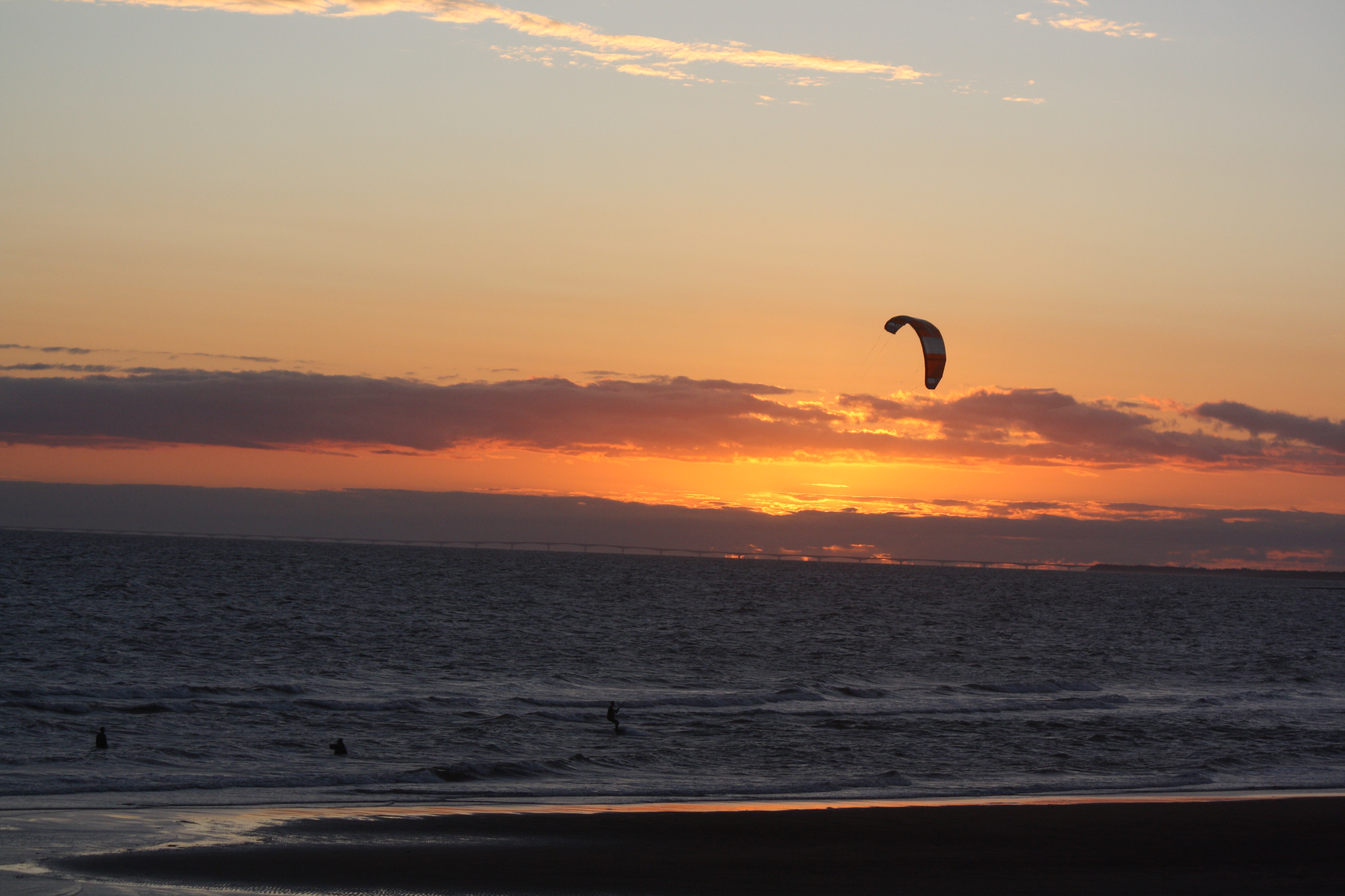 Kite against a sunset sky